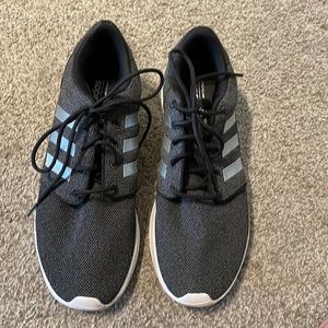 Women’s black adidas sneakers